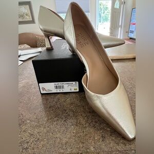 Women’s gold kitten heels